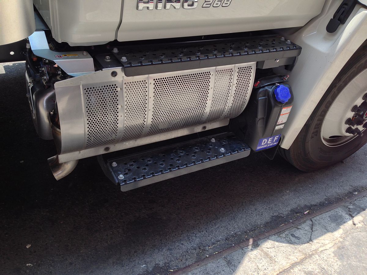 Hino truck and its selective catalytic reduction (SCR) next to the Diesel particulate filter (DPF) with regeneration process by the late fuel injection to control exhaust temperature to burn off soot