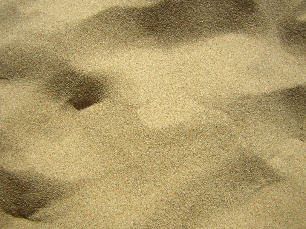 Sand on a beach, sand mining, fracking sand