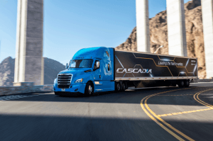 Daimler Trucks North America, Cascadia under bridge, Headlights prompt Daimler recall after 36 fires