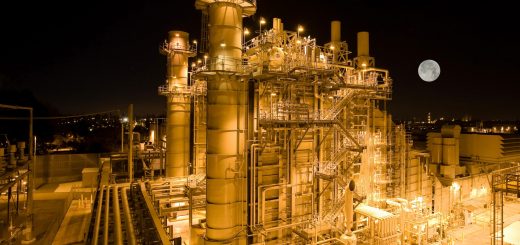 Natural gas plant at night with moon