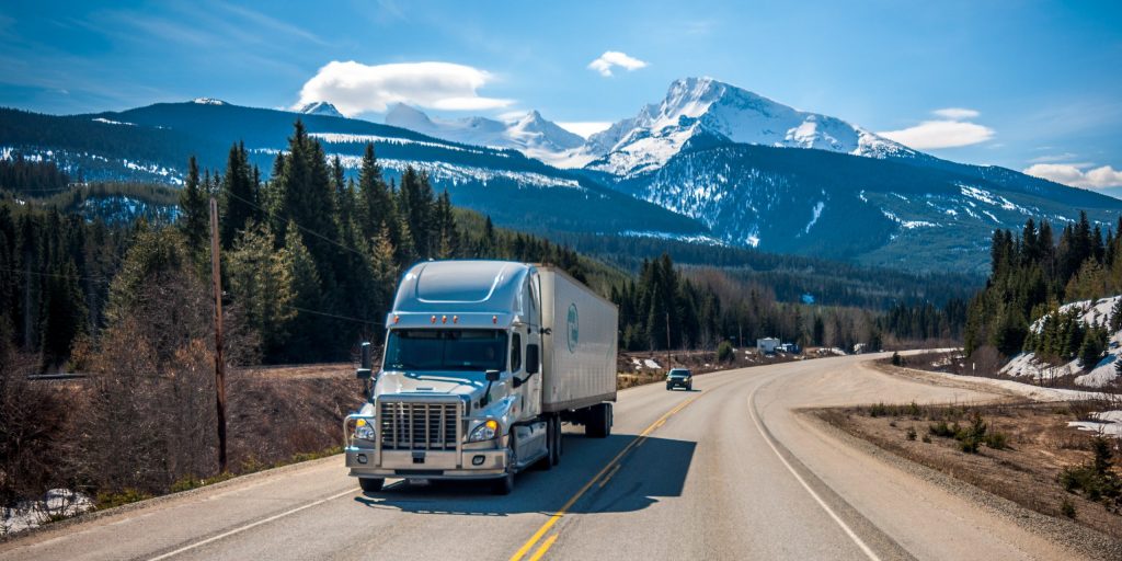 Highway truck Semi in mountains