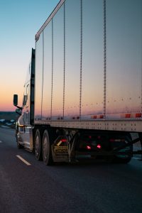 Sunset on Semi Truck - Photo by Caleb Ruiter on Unsplash