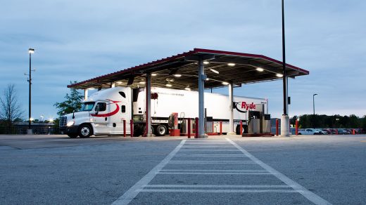 Ryder tractor and trailer parked at a Ryder fuel island