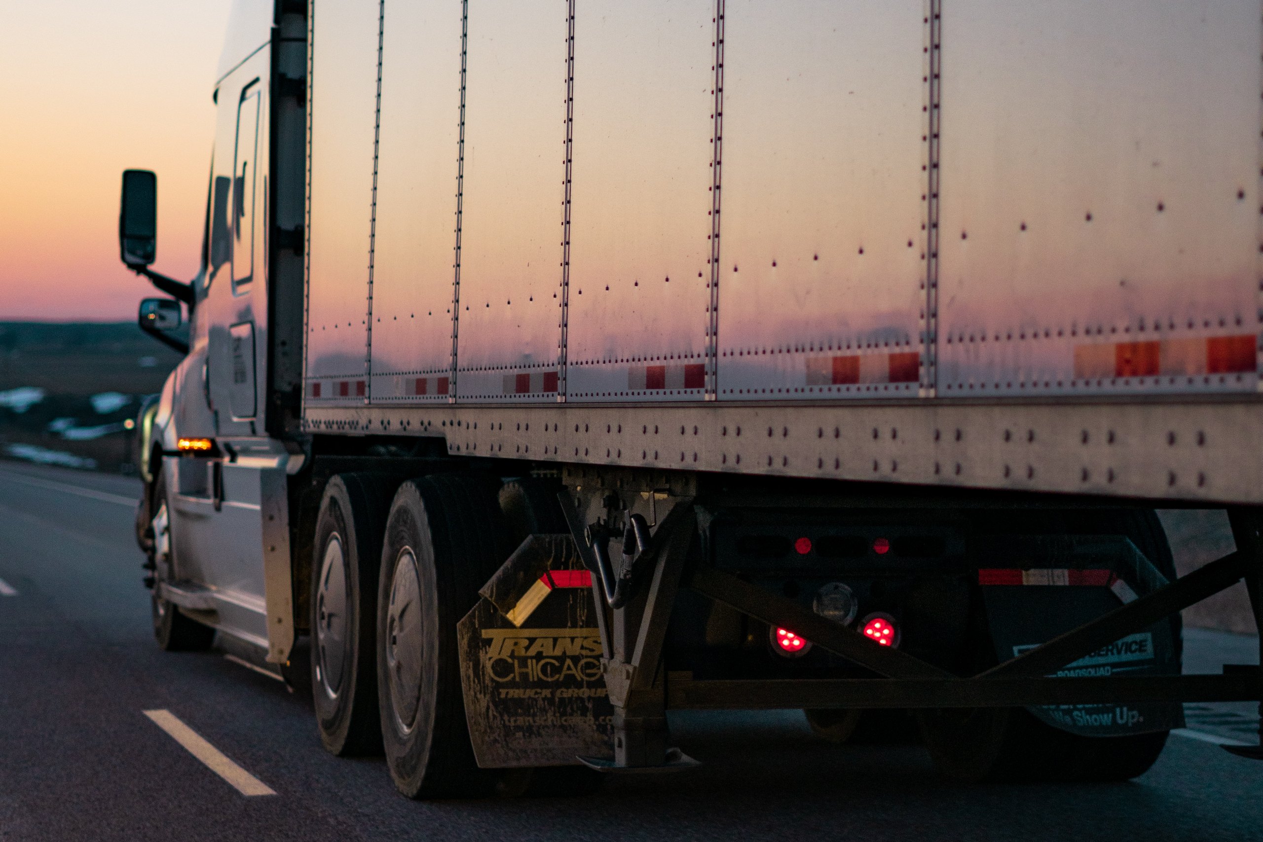 Sunset on Semi Truck - Photo by Caleb Ruiter on Unsplash