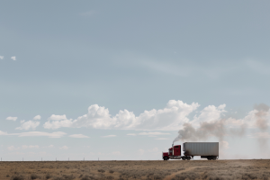 Truck emissions coming from truck on road in artistic render